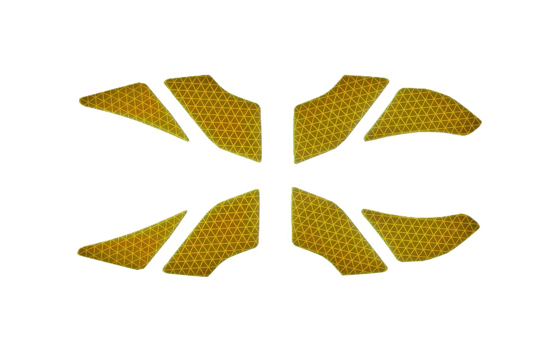 Gelbe reflektierende Aufkleber mit geometrischem Muster.