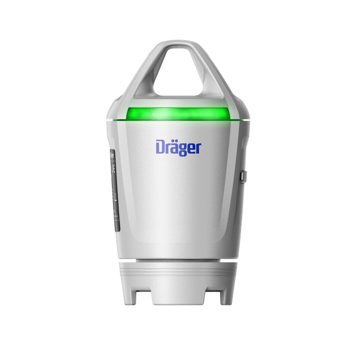 Sicherheitsgerät mit grünem Licht und Dräger Logo.