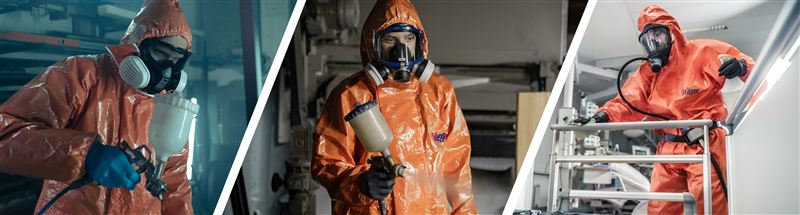 Dräger Sicherheitsschutzanzug SPC 4400 Personen tragen orange Schutzanzüge und Atemmasken bei der Arbeit.