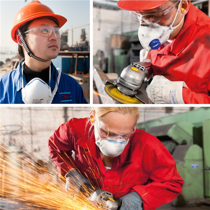 Schutzbrille für Industriearbeit Personen tragen Schutzbrillen und Atemmasken bei der Arbeit.