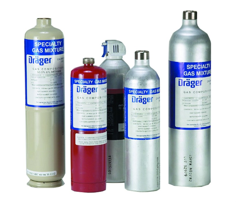 Fünf Dräger Gasflaschen unterschiedlicher Größe und Farben.