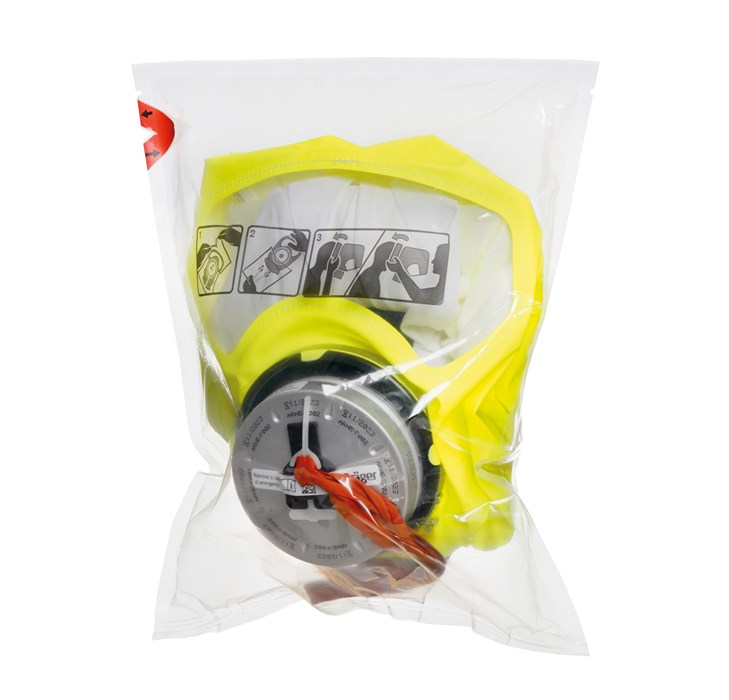 Eine gelbe Sicherheitsatemmaske in einer versiegelten Verpackung.