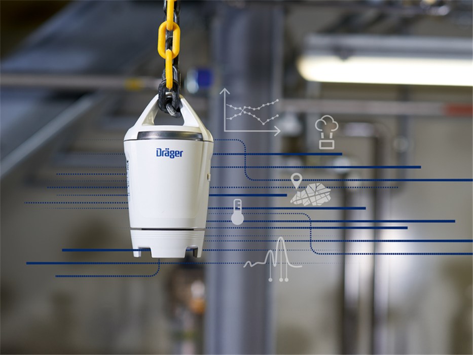 Dräger Sicherheitsgerät im Betrieb Weißes Dräger Sicherheitsgerät hängt an gelbem Haken.