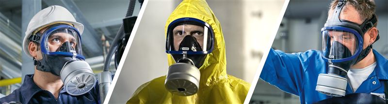 Atemschutzmasken im Einsatz Drei Personen tragen verschiedene Sicherheits-Atemschutzmasken in Arbeitskleidung.