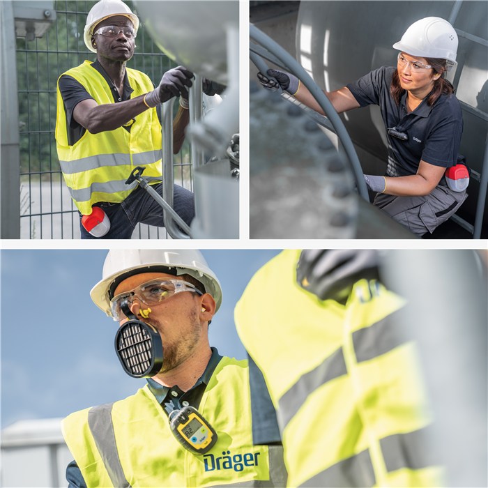 Arbeiter mit Dräger Arbeitsschutzweste Arbeiter in Schutzkleidung und Westen von Dräger beim Einsatz.