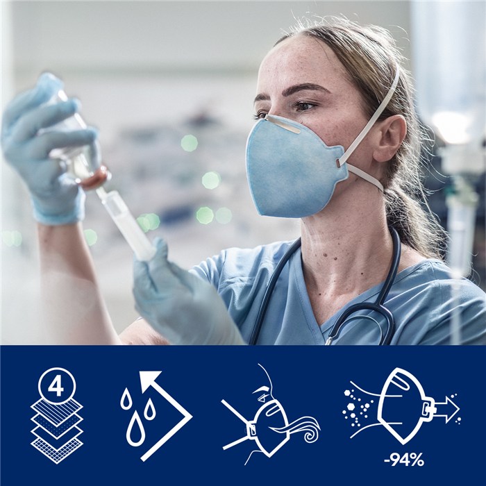 Schutzmaske X-plore 1720 in Aktion Person mit Schutzmaske und Spritze, fokussiert auf Sicherheitssymbole.