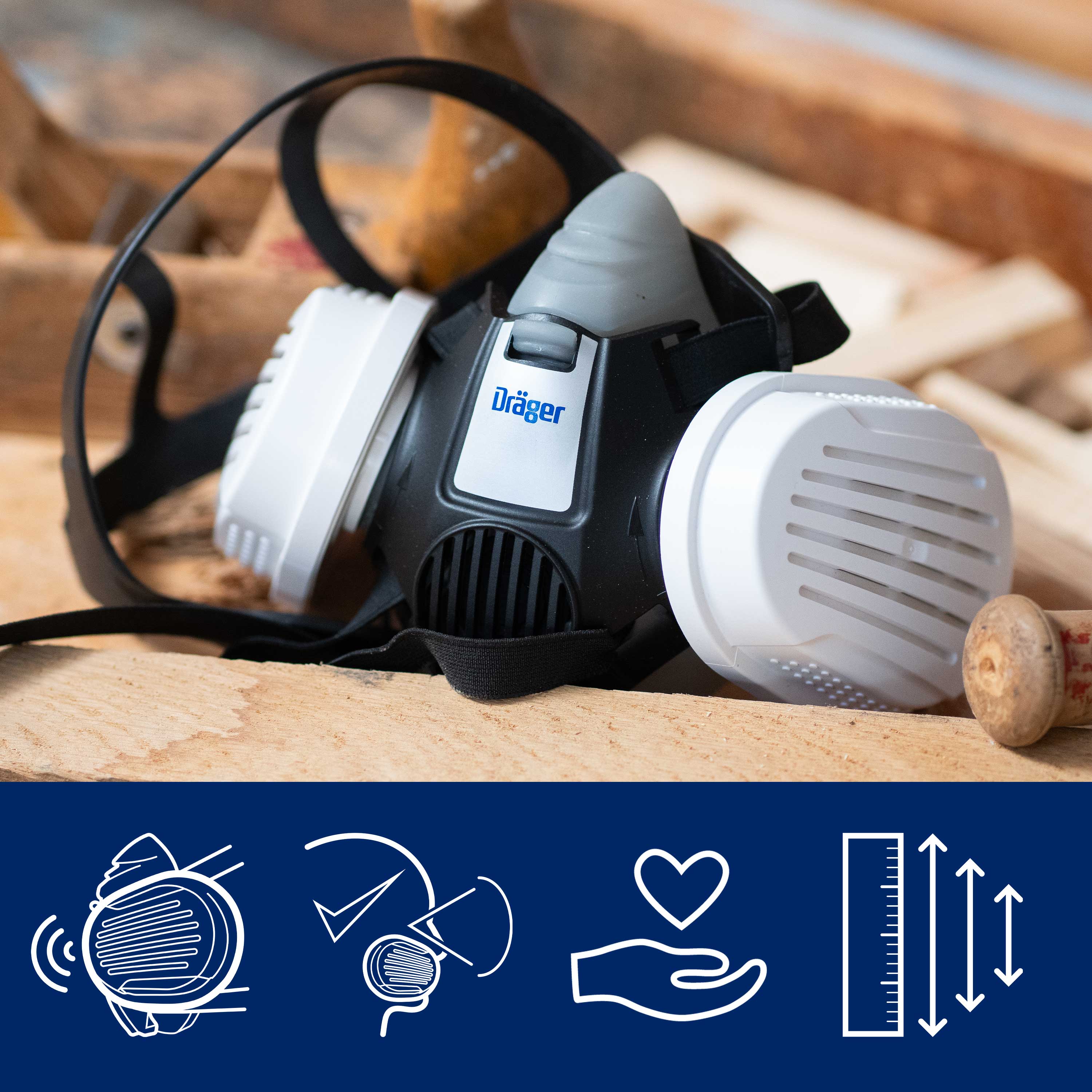 Die Dräger X-plore 3300 Halbmaske liegt auf Holzplanken.